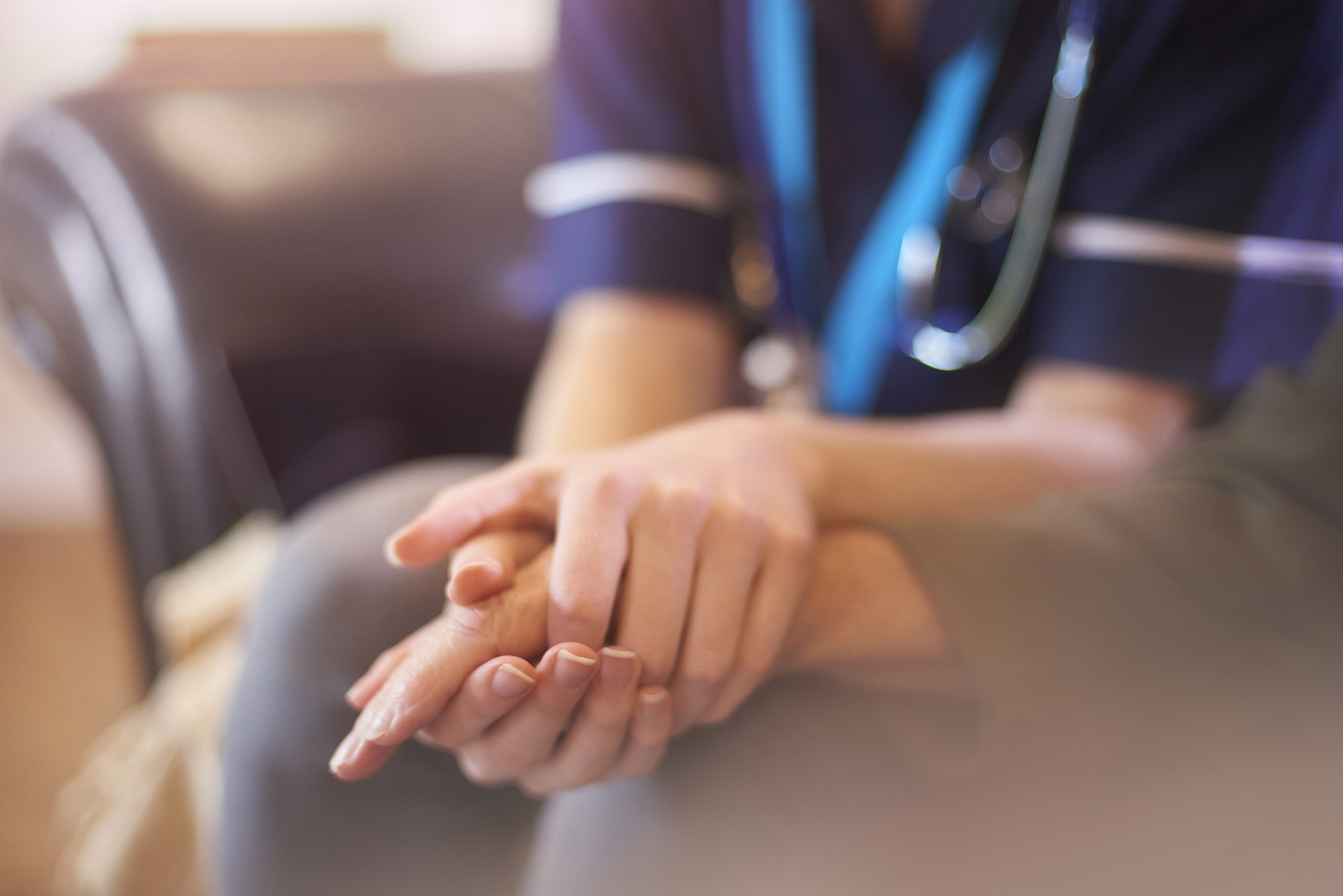 Nurse comforting patient - Paliative Care